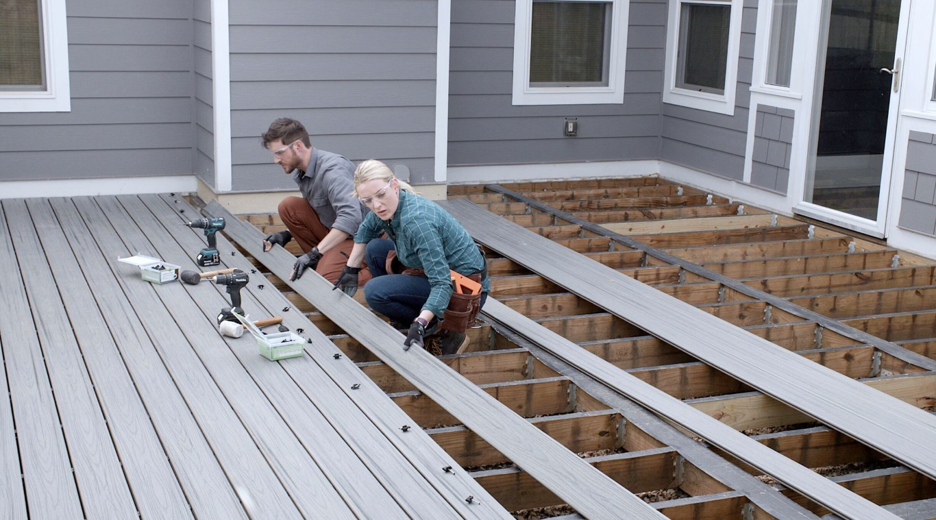 Professional deck installation team working in Stamford, CT